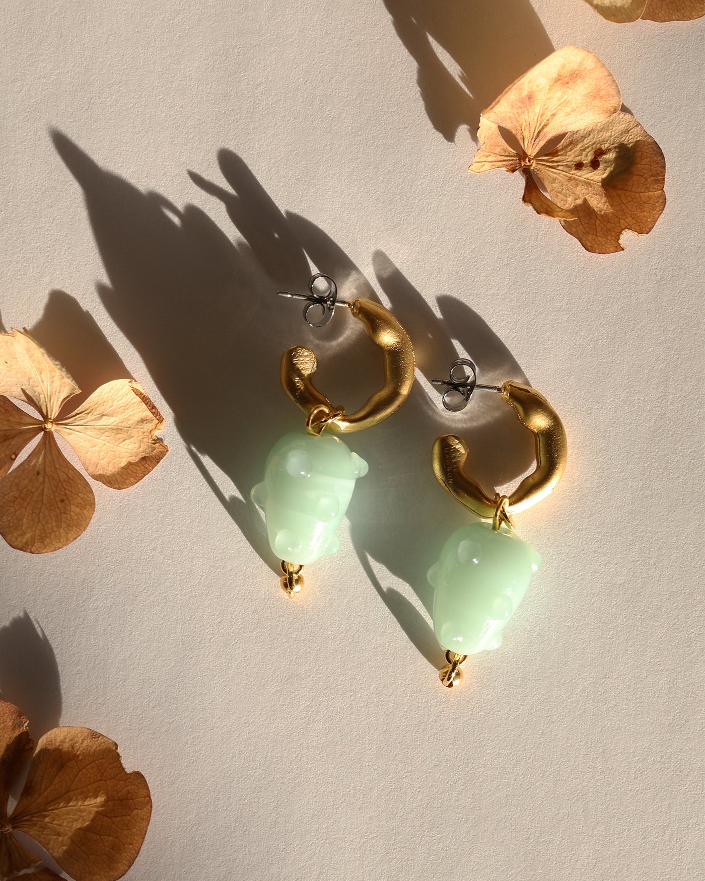 Nembus gold earrings
