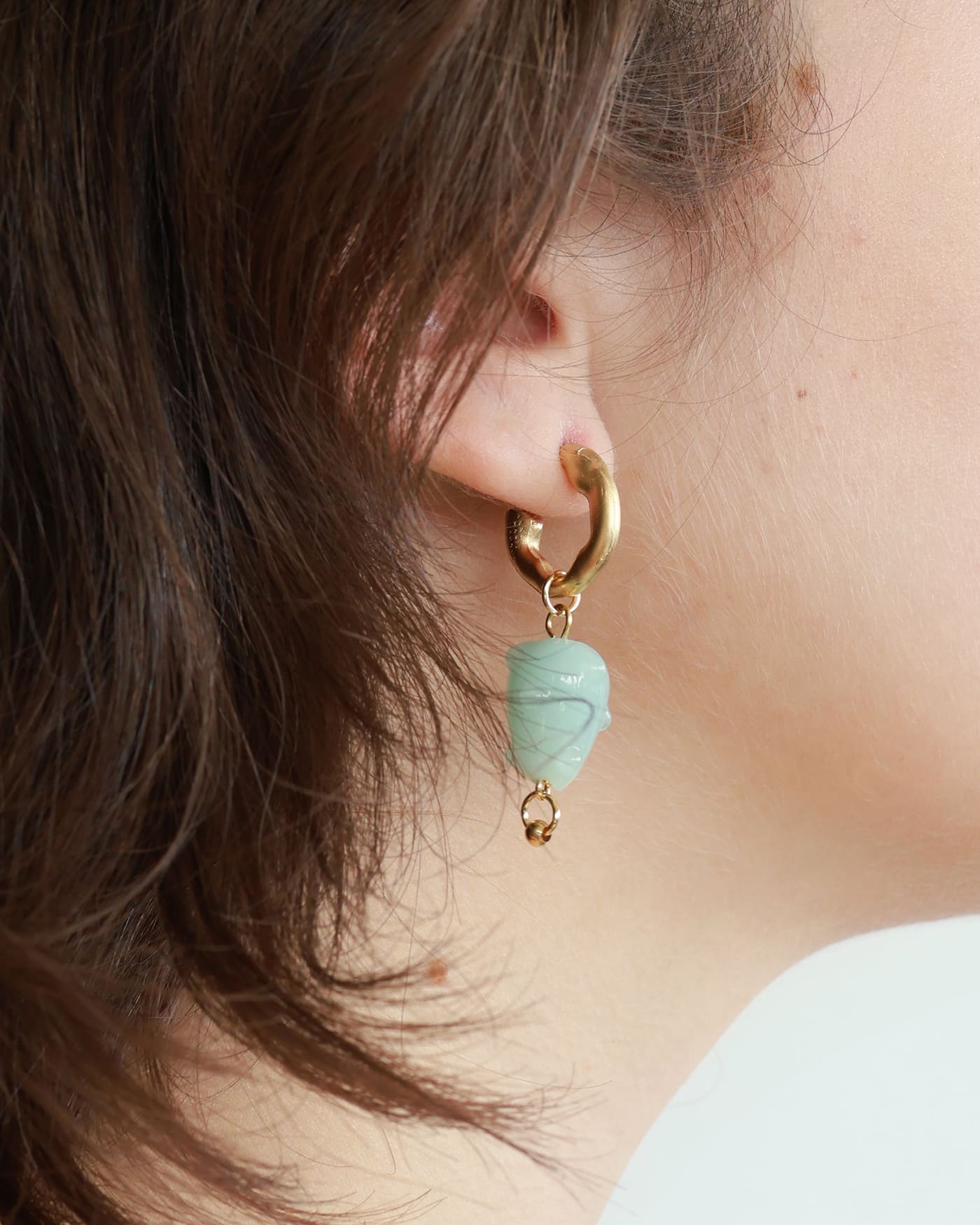 Nembus gold earrings